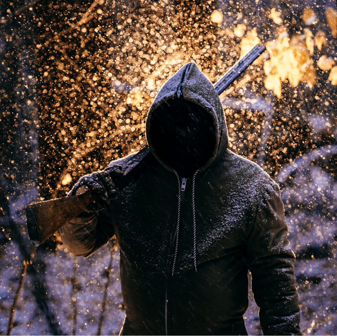 Dark silhouette carrying a weapon